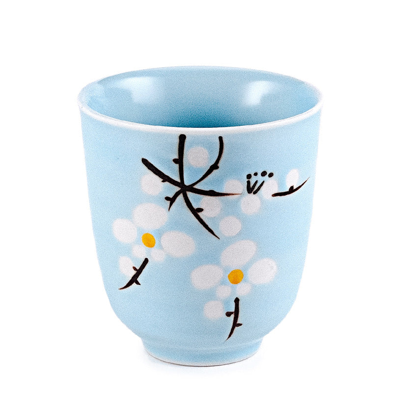Japanese Tea Cup with White Cherry Blossoms on a blue cup